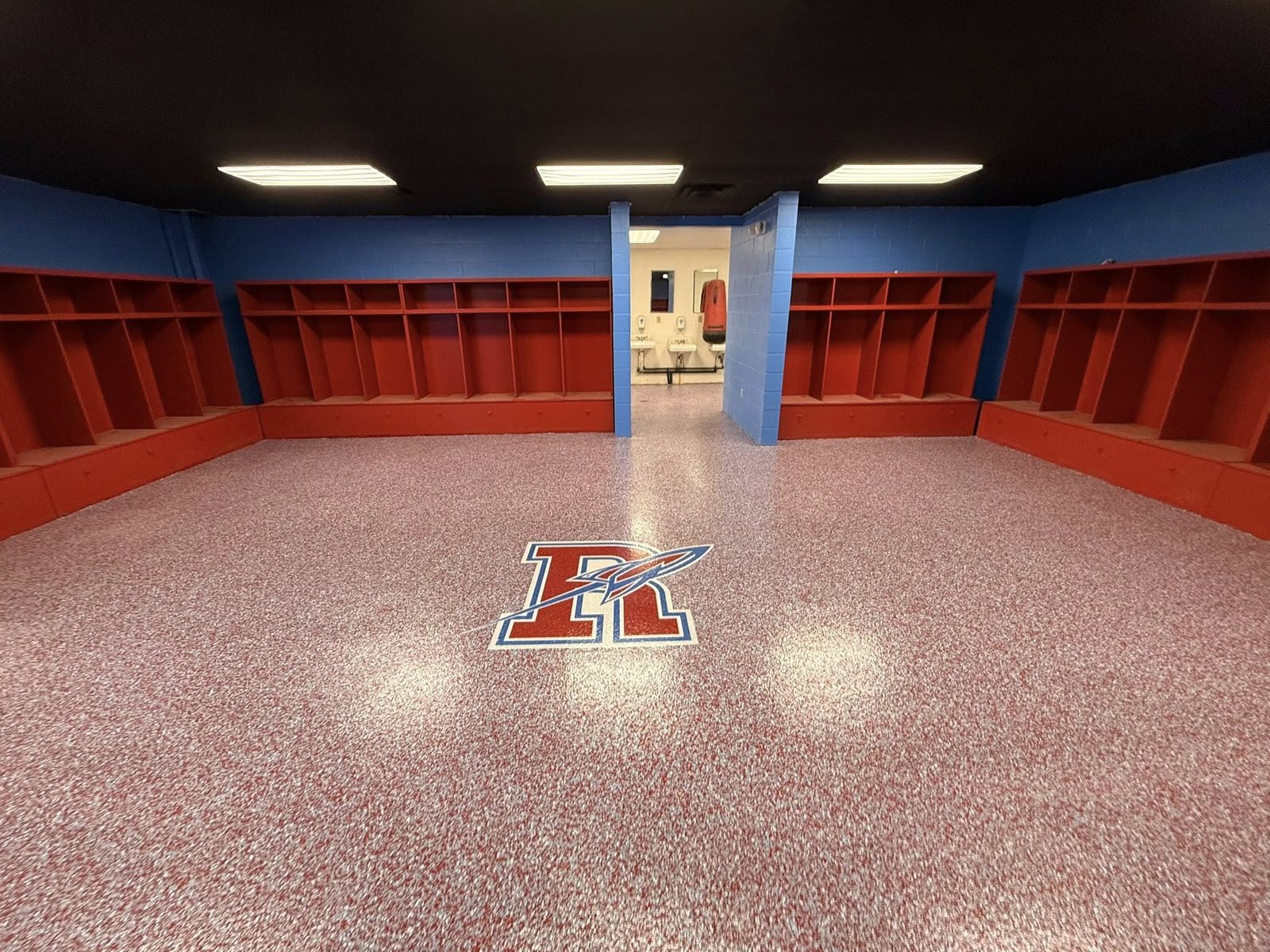 Deep maroon commercial gym epoxy floor
