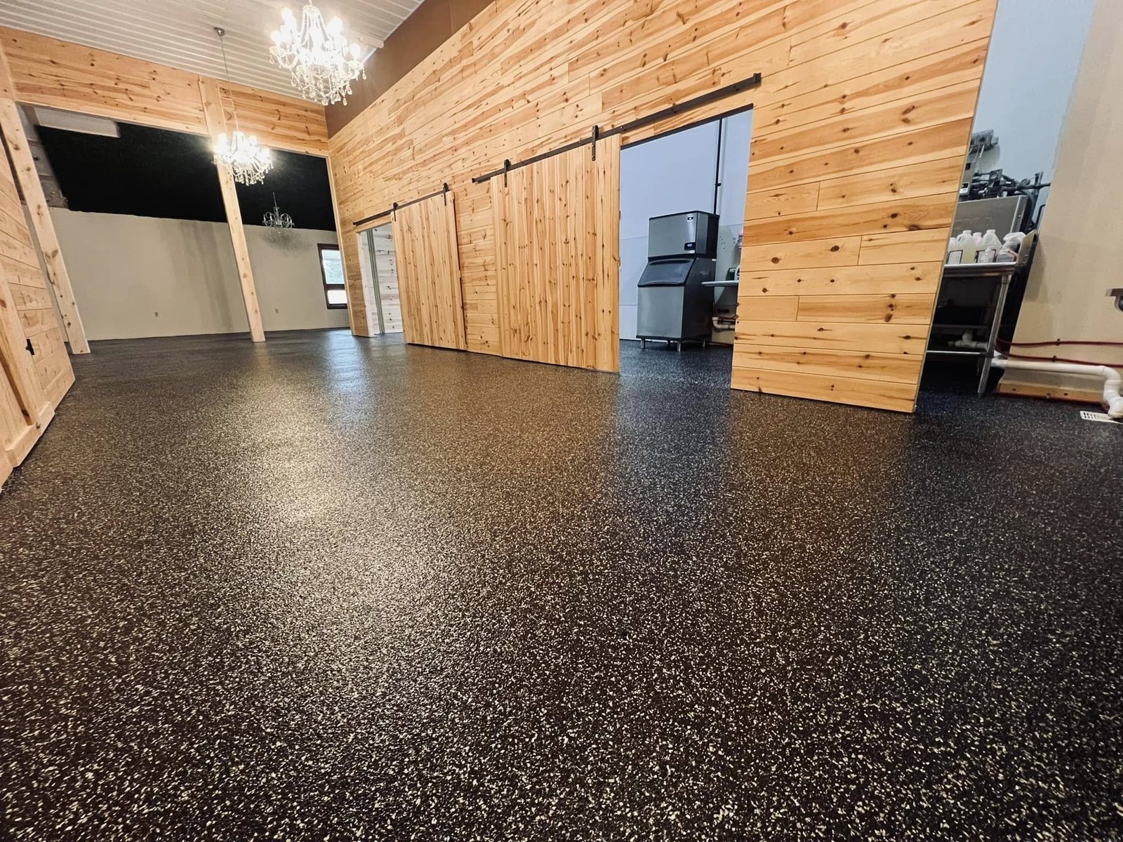 Speckled flake epoxy floor in a finished interior space